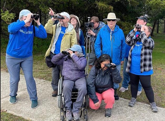 Birdability members pose together outdoors as "Team Nuthatch," having competed in the 2022 World Series of Birding