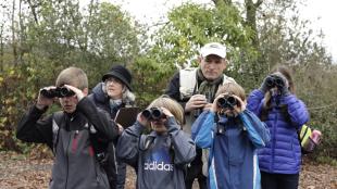 Tom Rusert with a young birder group